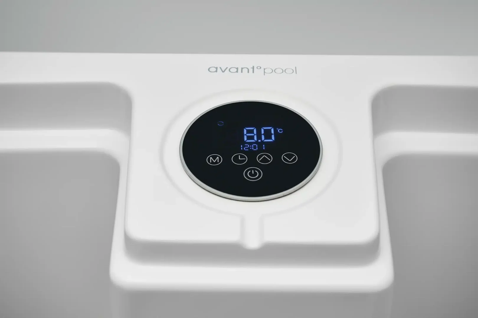 AvantPool pool control panel: white unit with circular black display showing 8.0°C and time 12:01, brand visible above the display